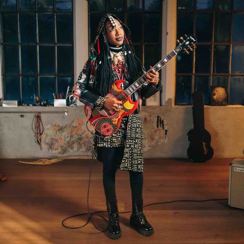 Front view of the Fatoumata Diawara SG showing the vibrant Ember Red mahogany body and signature graphic top.