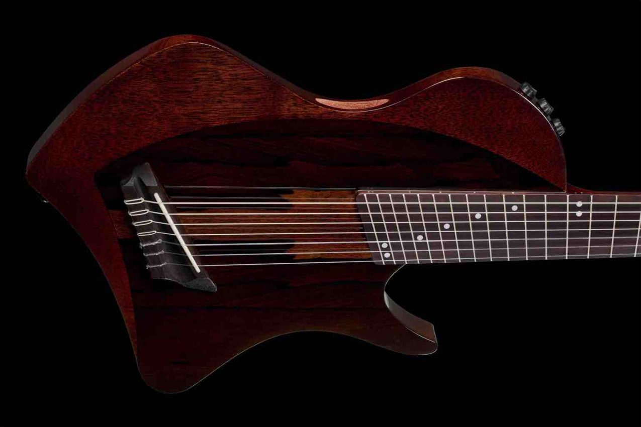 Abasi Concepts and Córdoba Stage 7-string nylon-string electric guitar featuring a chambered mahogany body with a solid spruce top in a Ziricote finish