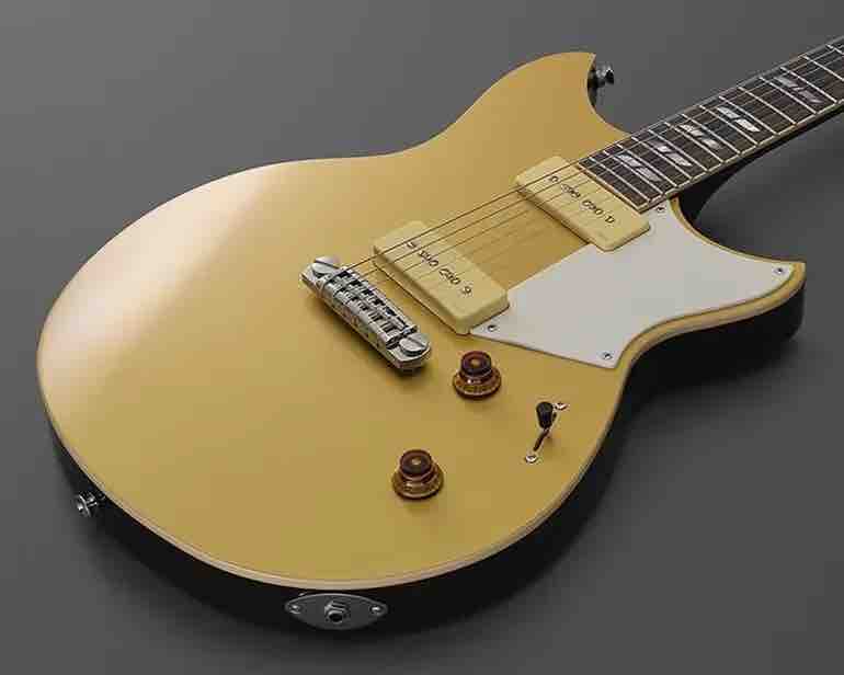 Yamaha RS02CB Chris Buck Signature Revstar electric guitar in Honey Gold finish with P90 pickups and wraparound bridge.