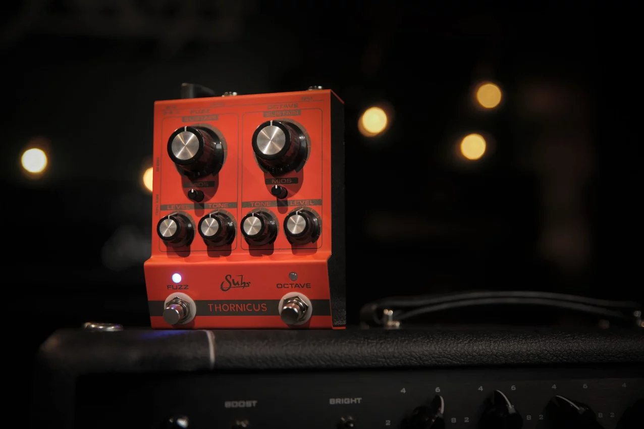 Suhr Thornicus Ian Thornley Signature Fuzz pedal featuring dual-channel controls, silver housing, and independent Fuzz and Octave footswitches.