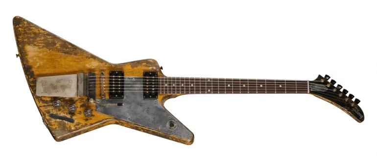 Gibson Leo Scala Master Artisan '58 Addiction Explorer guitar in aged Korina finish with gold hardware.