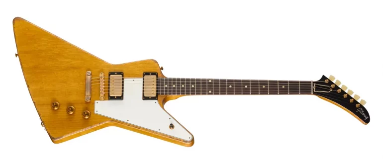 Gibson Leo Scala Master Artisan '58 Addiction Explorer guitar in aged Korina finish with gold hardware.