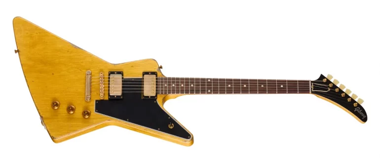 Gibson Leo Scala Master Artisan '58 Addiction Explorer guitar in aged Korina finish with gold hardware.