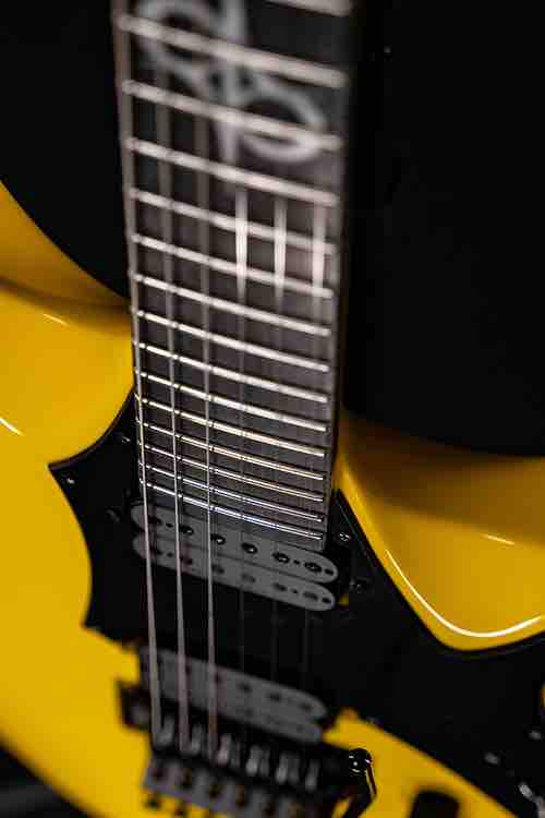 Close-up of the Solar Guitars AP1.6FRTY+ body highlighting the Duncan Solar+ pickups, black pickguard, and Gotoh 1996 Big Block tremolo system.