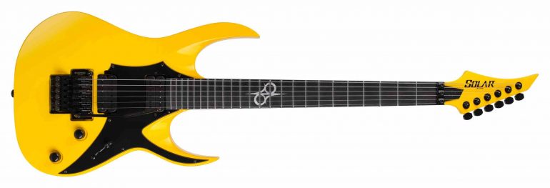 A full view of the Solar Guitars AP1.6FRTY+ electric guitar in a bright Taxi Yellow Gloss finish with a black pickguard, ebony fretboard, and Gotoh tremolo.