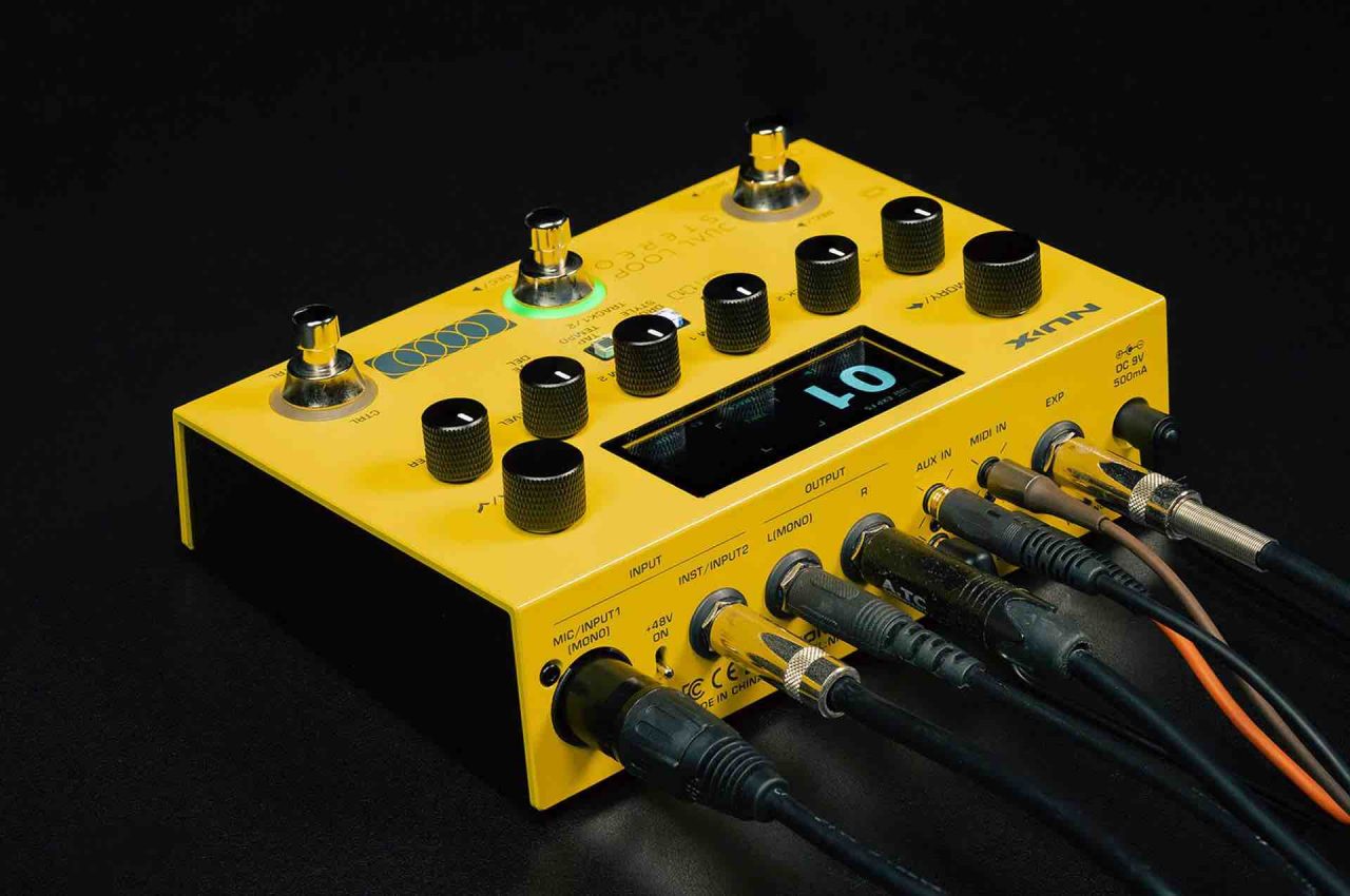 Rear view of the NUX Dual Loop Stereo looper showing the instrument input, mic/instrument combo XLR-1/4 inch jack, stereo outputs, MIDI ports, and USB-C connection