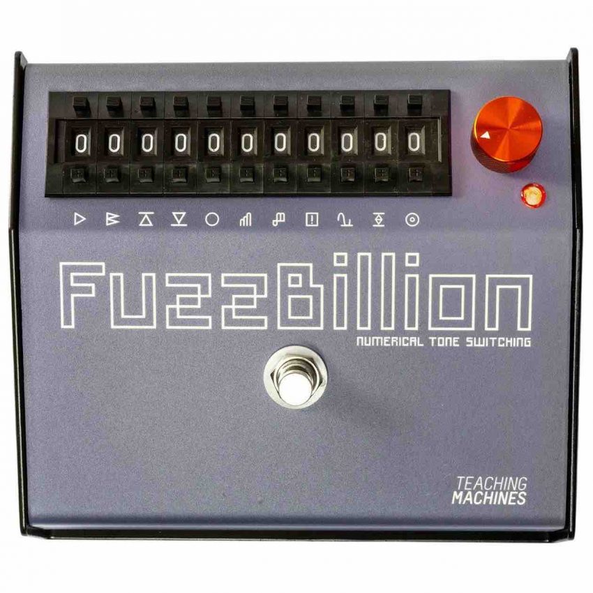 Top-down view of the Teaching Machines FuzzBillion distortion pedal showing eleven numerical thumbwheel switches, a large red master volume dial, and a silver industrial chassis.