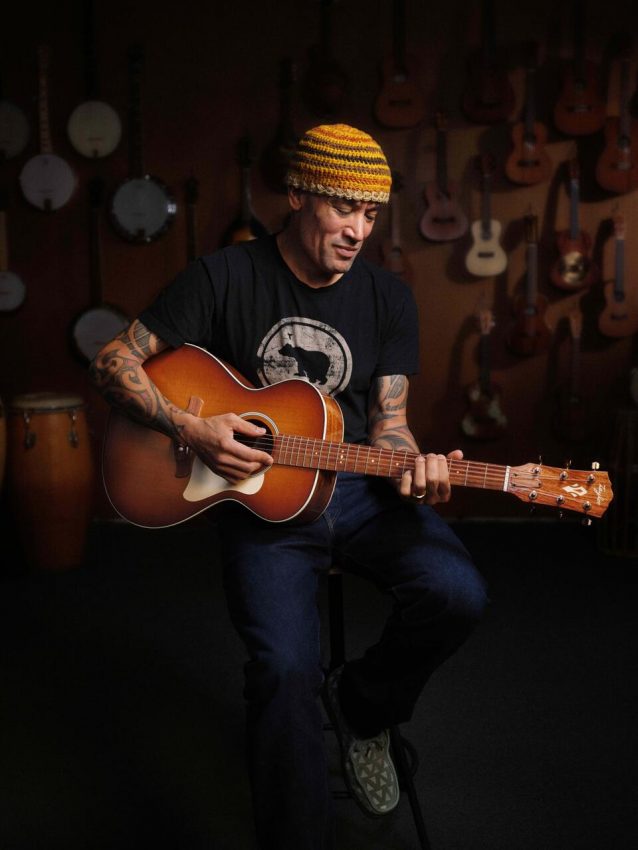 Taylor Ben Harper Gold Label 512e Special Edition electro-acoustic guitar featuring a shaded edgeburst torrefied spruce top, mahogany back and sides, and Honduran rosewood headstock.