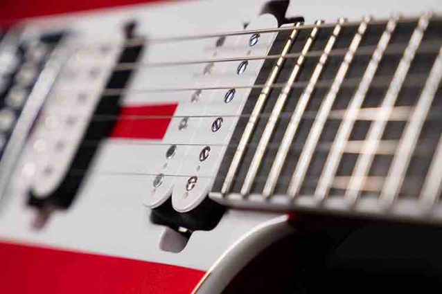 Solar Guitars S1.6RS CAR electric guitar in Candy Apple Red with white racing stripes, featuring EverTune bridge and Seymour Duncan pickups.